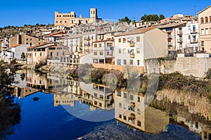 Reflection in the river in Valderrobres, Spain photo