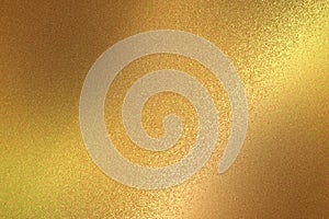 Reflection on rough gold metallic sheet surfaces, abstract texture background