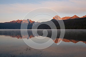 Reflection of Sawtooth Mountains at Sunrise on Redfish Lake, Idaho