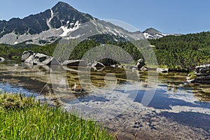 Reflection of Sivrya peak and Banski lakes, Pirin Mountain