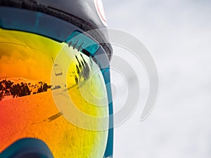 Reflection of a ski lifts in googles