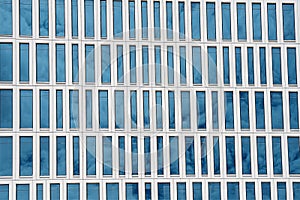 Reflection of the sky on the window of the building.