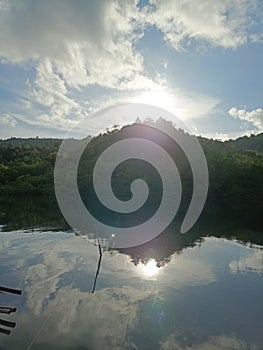 Reflection at sunset blue sky from sangihe photo