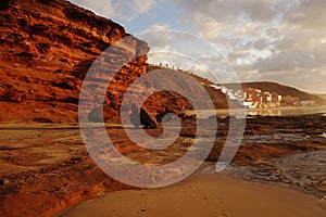 Reflection of sunset on cliffs