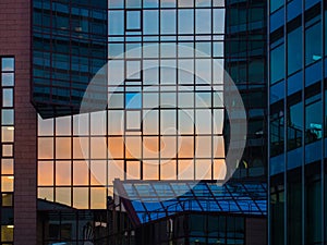 Reflection of sunset in the facade of a skyscraper, Frankfurt