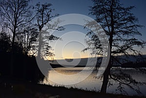 Reflection sunset at a lake