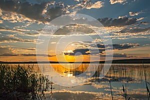 Reflection of Sunset Over Lake