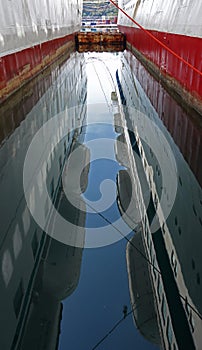 reflection of two cruise ships in the sea, Shipyards, Chalkis, Greece