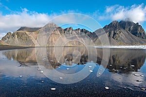 Reflection of Vestrahorn mountain in Stokksnes, Iceland