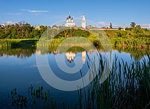 Reflection in the water of an ancient monastery in the city of Suzdal. The beauty of the Russian province