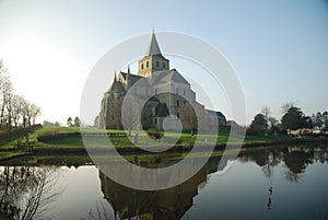 Reflections of an Abbey Against Clear Blue Skies