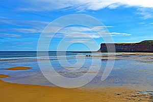 Reflections on the beach at Saltburn by the Sea, North Yorkshire, England