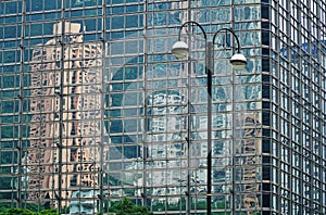 Reflections of buildings on a glass building