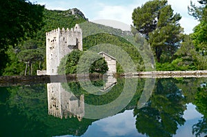 Reflections of a castle in the Mediterranean forest, Spain, EspaÃÂ±a photo
