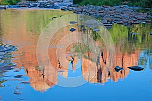 Reflections of Cathedral Rock on Oak Creek near Sedona, Arizona.