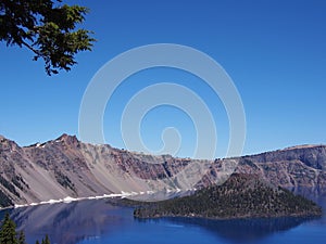 Reflections in deep blue Crater Lake