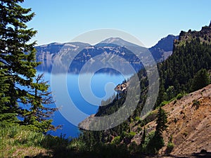 Reflections in deep blue Crater Lake