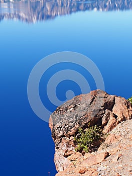 Reflections in deep blue Crater Lake