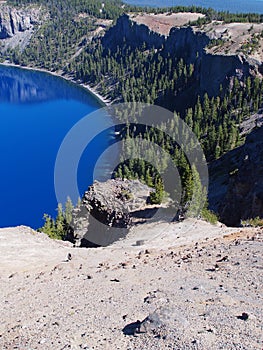 Reflections in deep blue Crater Lake