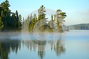 Reflections on a Foggy Wilderness Lake