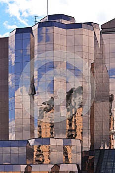 Reflections from a glass building at Salford dock area in Manchester UK photo