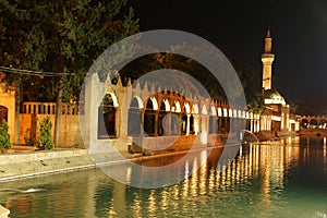 Reflections of Halil Rahman Cami on the pool of Abraham