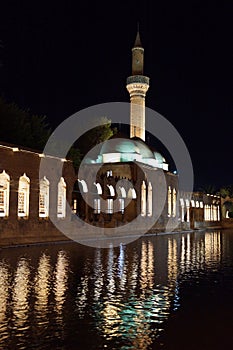 Reflections of Halil Rahman Cami on the pool of Abraham photo