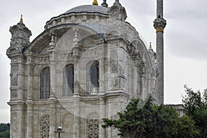Reflections from the historical mosque in the frame