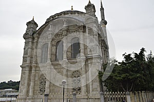 Reflections from the historical mosque in the frame