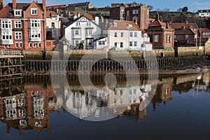 Reflections of homes and buildings in Whitby