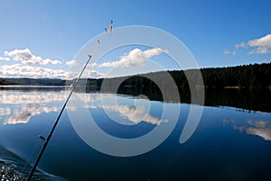 Reflections with lone fishing rod on Lake Maraetai, Mangakino, Taupo New Zealand Aotearoa photo