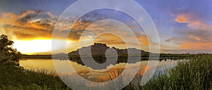 Reflections of mountains and sky