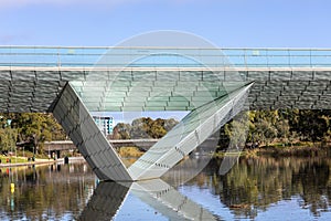 Reflections of the River Torrens foot bridge in Adelaide South Australia on July 23rd 2023