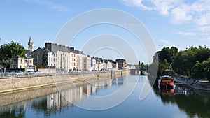 Reflections in the sarthe river at Le Mans, France.