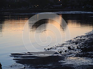 Reflections on the sea at sunset, coast of Evvia Euboea, Greece, in Spring