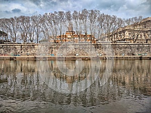 Reflections on the Tevere river, Rome Italy photo
