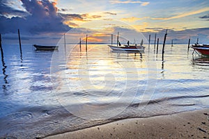 Reflections when the tide recedes in the morning with the beautiful sunrise.