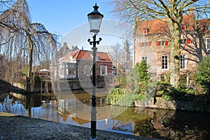 Reflections of Tinnenburg House on the right side, an impressive historic building dated from 1414