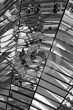 Reflections of tourists seen in the Reichstag dome