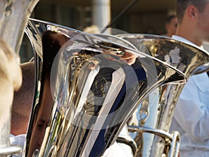 Reflections in trumpets during musical performance photo