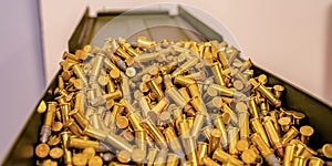 Reflective golden bullets on an open metal box