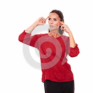Reflective latin girl with wondering gesture