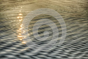 reflective light Image Description: rippled reflections on the water. this is natural image, without photoshop artistic filters.
