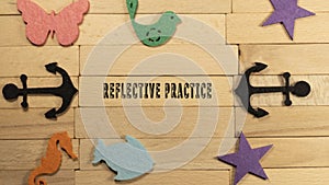 Reflective practise plan written on wooden surface. Education and child development