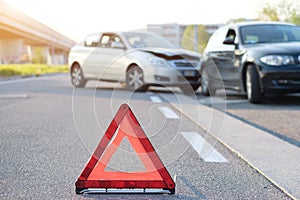 Reflective red triangle to point out car crash photo
