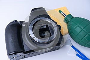 Reflex camera cleaning tools on white background