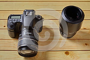 Reflex camera with photo lenses