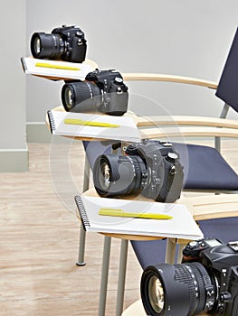 Reflex digital camera in classroom photoschool
