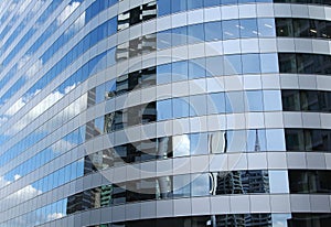 Reflex of sky on building