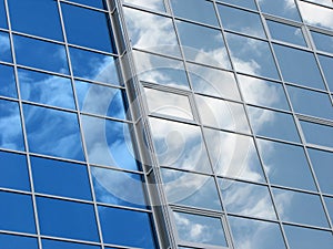 Reflexion of the sky and clouds in windows